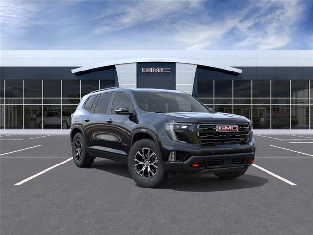 2026 GMC Acadia AT4 in Ebony Twilight Metallic — front three-quarter view