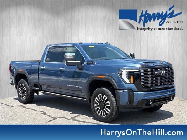 2026 GMC Sierra 2500 HD Denali Ultimate in Downpour Metallic — front three-quarter view