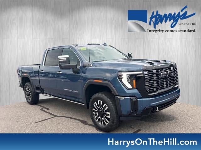 2026 GMC Sierra 2500 HD Denali Ultimate in Downpour Metallic — front three-quarter view
