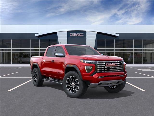 2026 GMC Canyon Denali in Volcanic Red Tintcoat — front three-quarter view