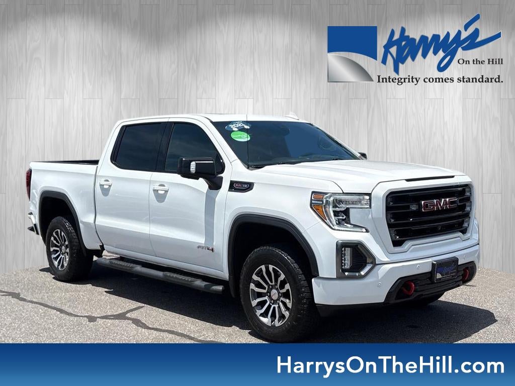 2021 GMC Sierra 1500 AT4 in Summit White — front three-quarter view