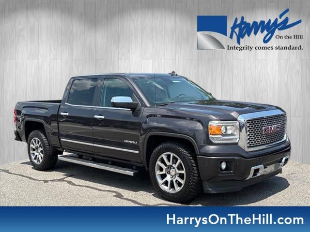 2015 GMC Sierra 1500 Denali in Iridium Metallic — front three-quarter view