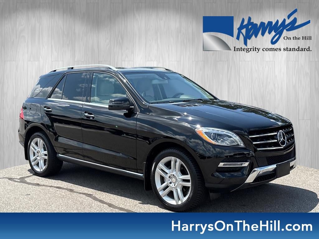 2014 Mercedes-Benz M-Class ML 350 BlueTEC in Obsidian Black Metallic — front three-quarter view